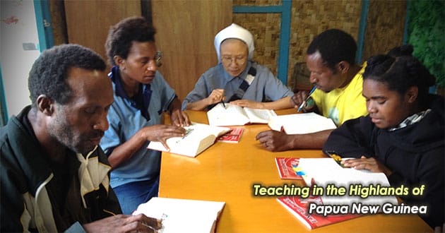 PNG_Teaching-in-the-Highlands-of-PNG_Benedicta_with_Bible_students_w630