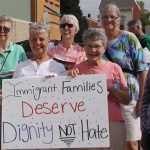SNDs de Covington fazem passeata por reforma imigratória